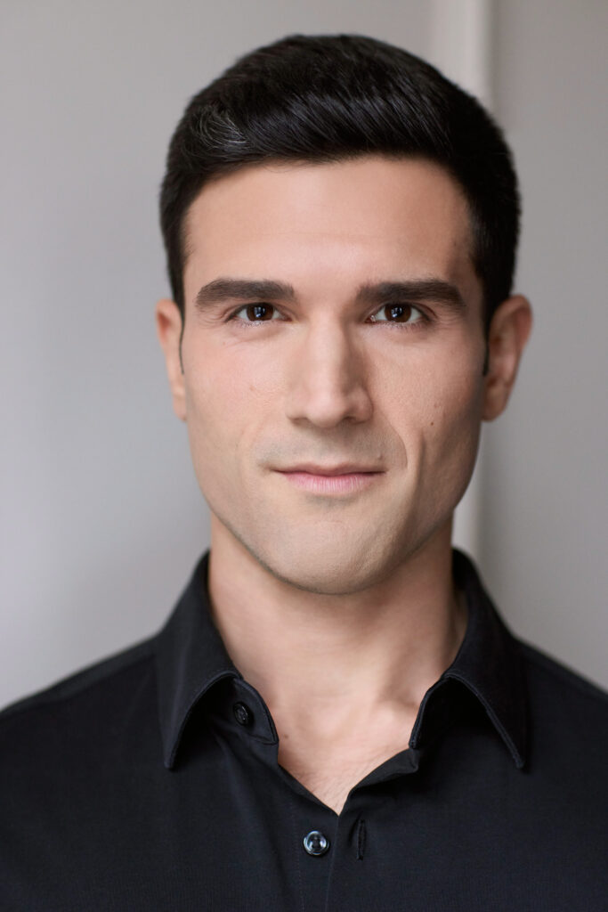 Markos Kandilis in a black shirt