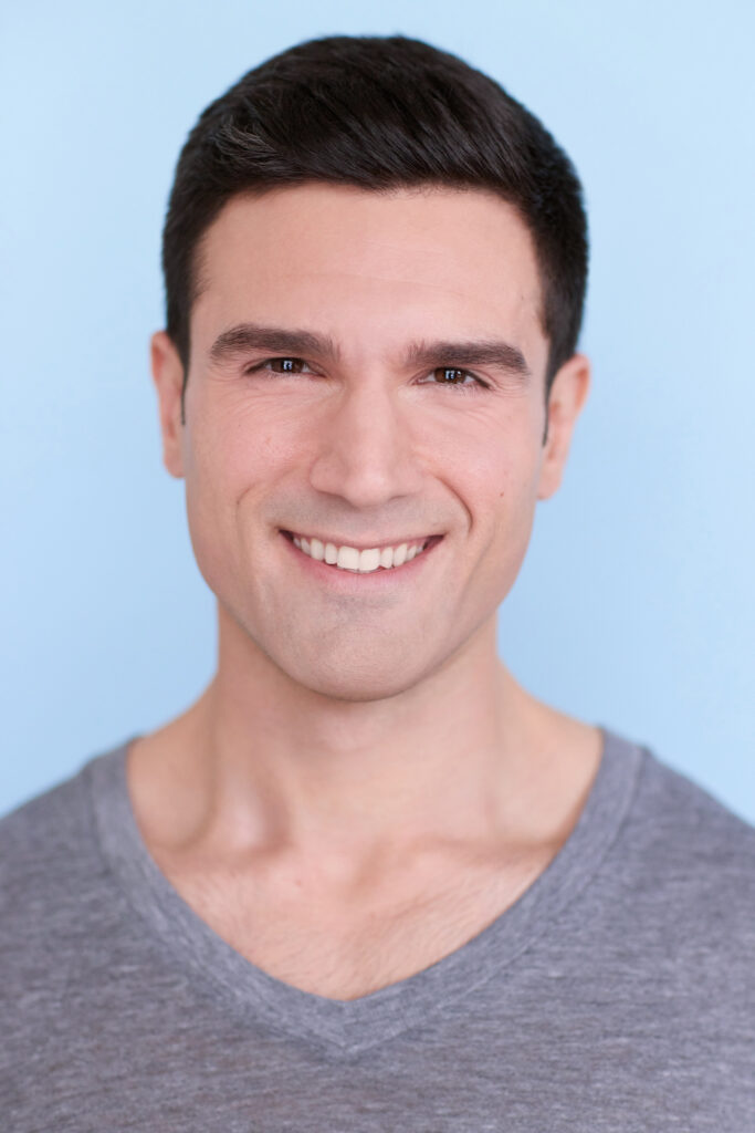 Markos Kandilis in a grey shirt