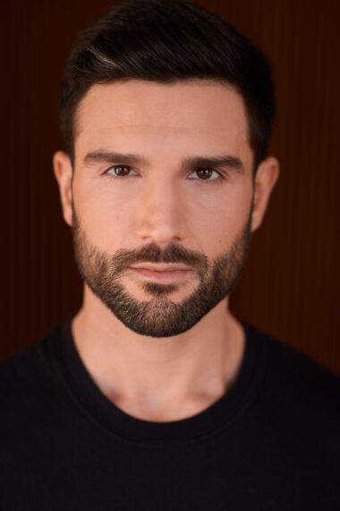 Markos Kandilis in a black shirt